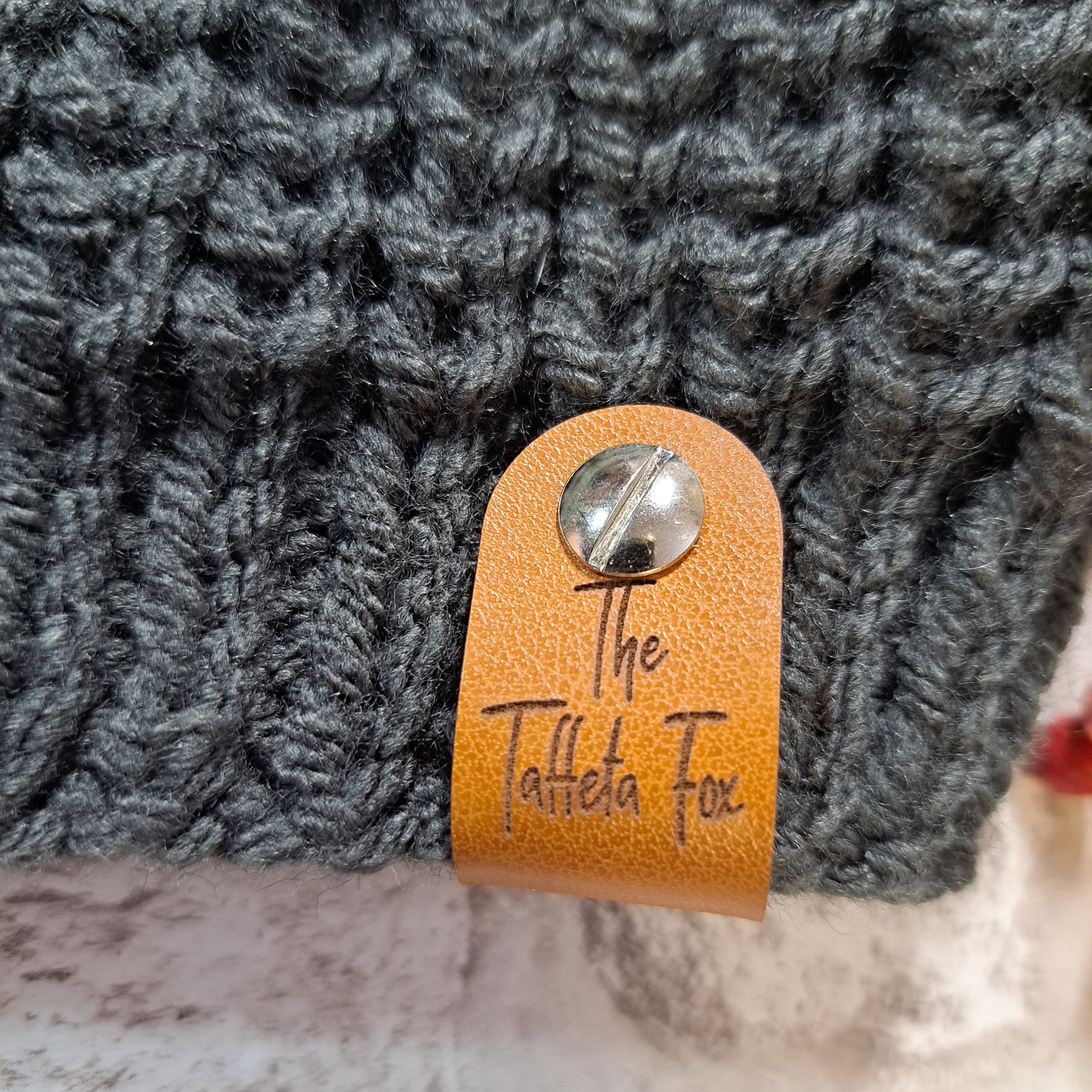 Dark Grey Men's Hand Knit Hat - Tag Close Up 